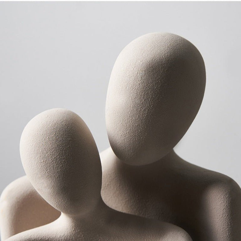 Modern sculpture symbolizing connection and tenderness 